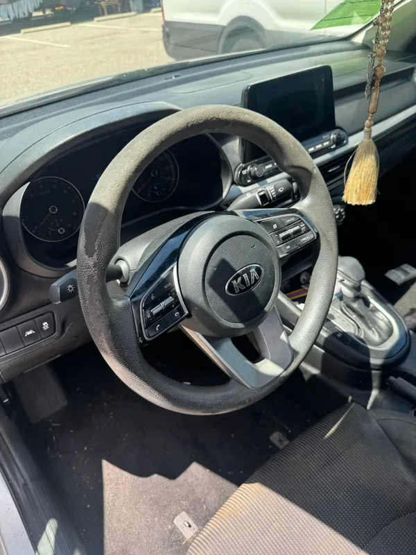 The Kia's driver's seat view with the steering wheel, column shrouds and instrument cluster all back in place