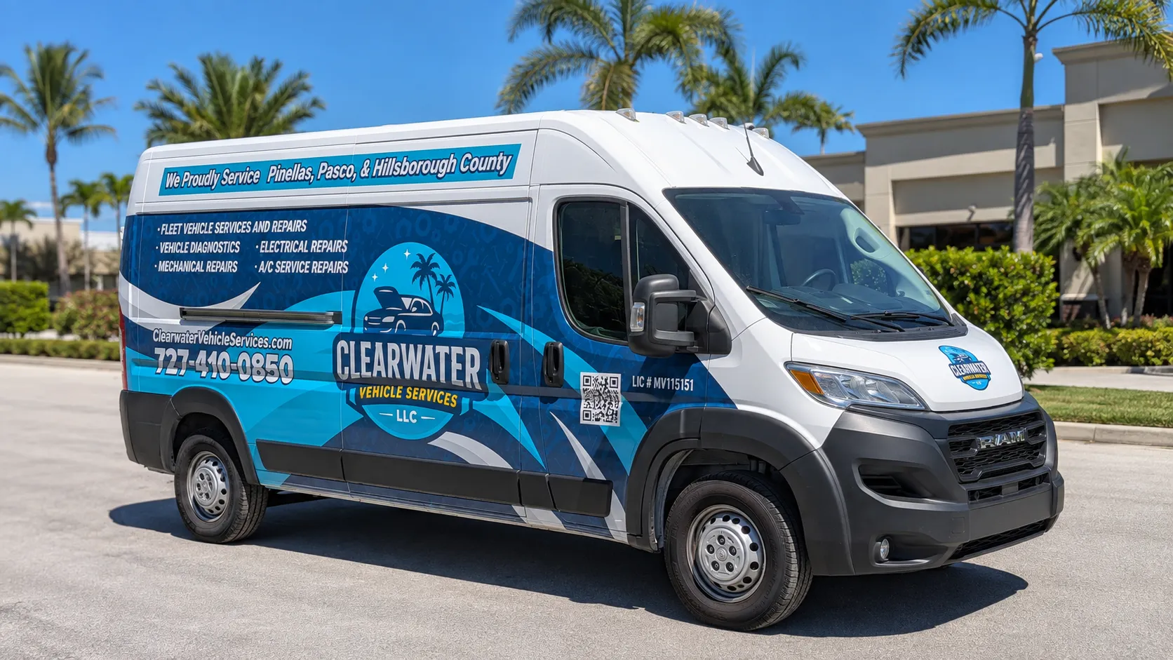 The Clearwater Vehicle Services van parked outside a commercial building under palm trees, seen from the front corner, with the wrap's service list, website and phone number along the side